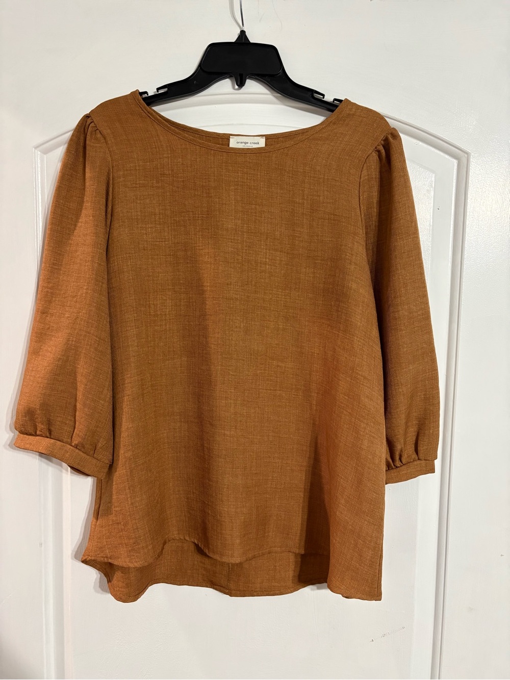 Camel colored blouse